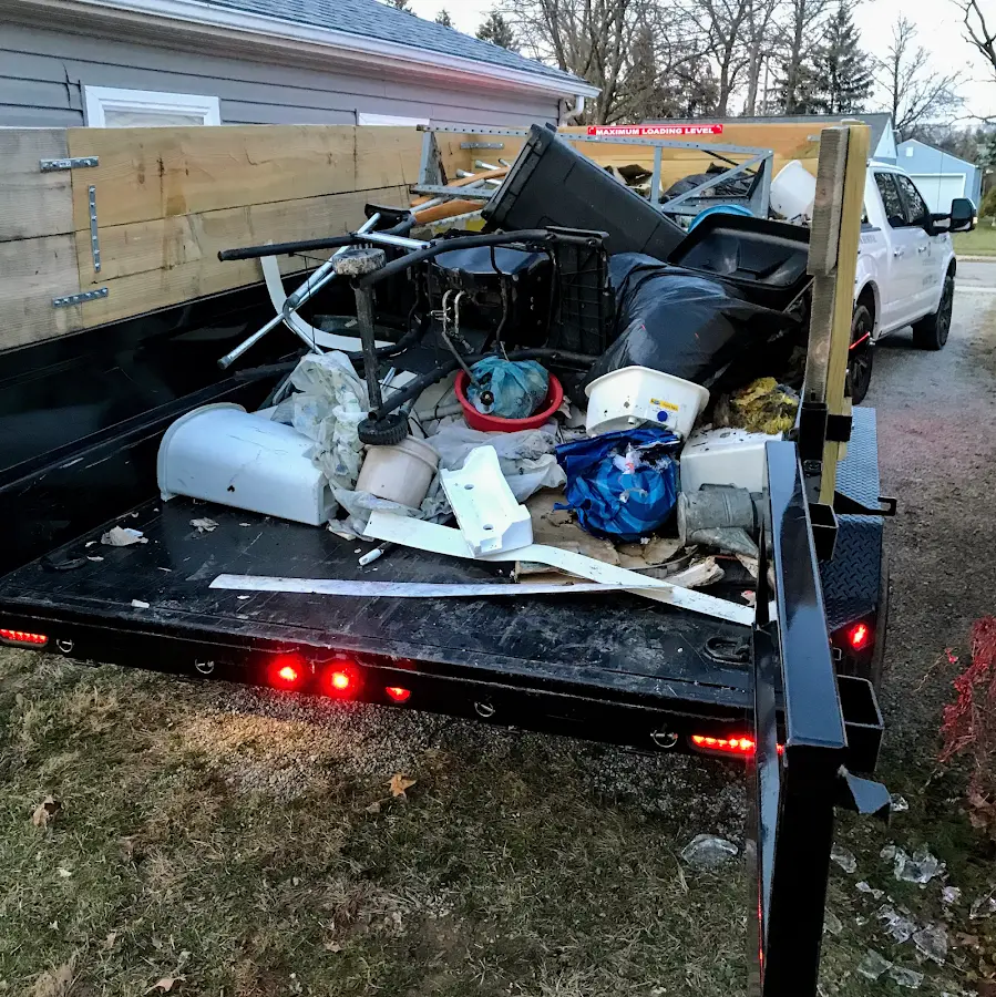 Roll-off dumpster delivered to a residential driveway in Parksdale