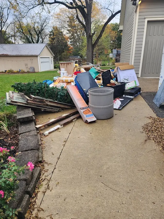 Dumpster being loaded with debris for 3 Yard Dumpster Rental in Parksdale